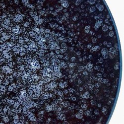 Assiette ronde mouchetées bleues